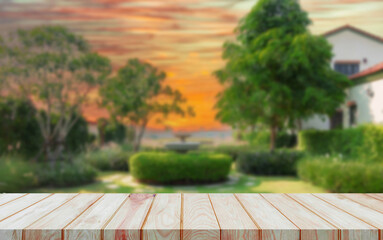 perspective board over blurred garden in countryside