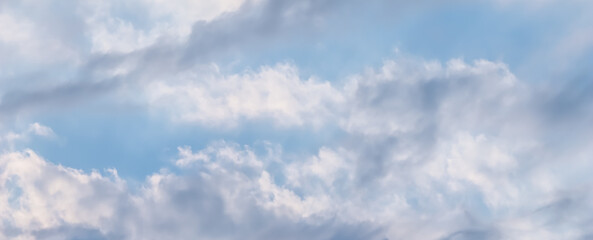 Wall Mural - background of blue sky with white clouds