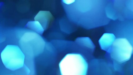 Wall Mural - This is a stock motion graphic that shows the blue organic bokeh of an optical lens.