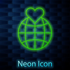 Poster - Glowing neon line Human hand holding Earth globe icon isolated on brick wall background. Save earth concept. Vector