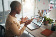 © Allistair/peopleimages.com - Laptop, video call and a business black woman in her office, talking during a virtual meeting with a colleague. Computer, internet and webinar with a female employee chatting online to a coworker