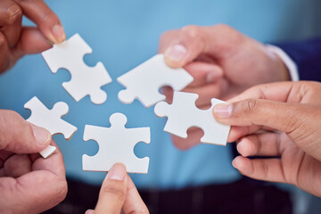 Poster - Hands, puzzle and team closeup of collaboration, creative and partnership, unity and cooperation. Zoom, hand and jigsaw formula by business people with synergy, teamwork and integration or strategy