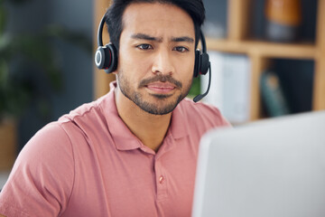 Fototapete - Serious asian man, call center and computer with headphones for customer service, help or support at office. Focused male consultant or agent with headset on PC for telemarketing or online advice