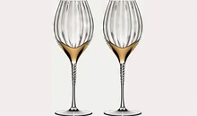  Two Champagne Glasses With Gold Rims On A White Background.  Generative Ai