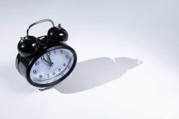 Alarm clock on white background