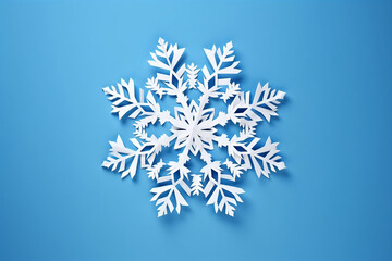 Wall Mural - Snowflake in Kirigami paper cut style on blue background