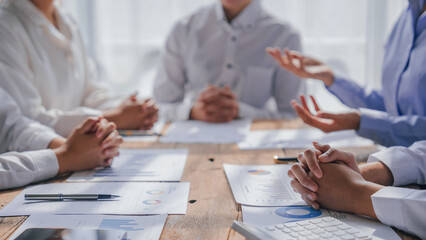 Wall Mural - Attractive business people at meeting, Leadership vision, collaboration and teamwork of a business team in an office work meeting. Asia female hands close up.