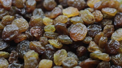 Poster - dried fruits. natural raisins rotate in circle
