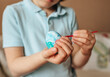 © Aleksandra Beliaevsk - Boy painting Easter eggs