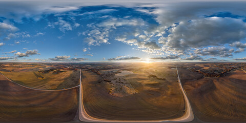 Wall Mural - aerial full seamless spherical hdri 360 panorama view from great height above fields in countryside 