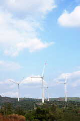 Wall Mural - Wind generator turbines at wind farm. Alternative energy concept.