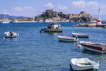 Wall Mural - Old Fortress and boats on Garitsa Bay, Ionian Sea coast in Corfu town on Corfu Island, Greece