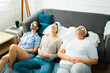 © AntonioDiaz - Relaxed young women wearing face masks at a slumber party