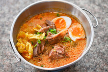 Curry Bone Soup Pork Bone Soup With Boiled Eggs In Hot Pot, Thai Food Tom Yum Hot And Sour Soup