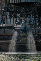 Wall Mural - Bucket during dredging in the port of Odessa