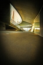 Vertical Shot Of Walkways Found Under The Erasmusbrug Bridge In Rotterdam, Netherlands