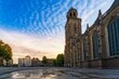 Low angle of the St Lebuinus protestant church in Deventer, Netherlands against the scattered clouds