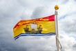 Flag of the New Brunswick in Canada against a cloudy sky