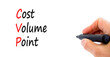 © Dzmitry - CVP cost volume profit symbol. Concept words CVP cost volume profit on white paper on a beautiful white background. Businessman hand. Business and CVP cost volume profit concept. Copy space.