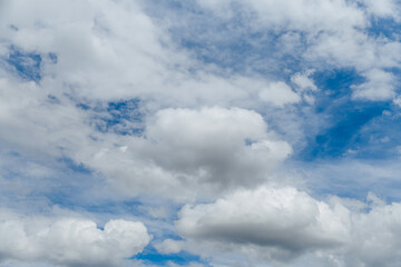 Wall Mural - white, fluffy clouds in blue sky. background from clouds