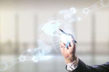 Aufkleber - Man hand with pen working with abstract virtual robotics technology hologram with globe on blurred office background, artificial intelligence and machine learning concept. Multi exposure