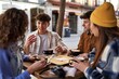 © Asier - A multicultural group of friends enjoying coffee and tea after their vacation.