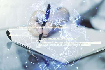 Aufkleber - Abstract creative coding concept with world map and man hand writing in notebook on background. Multiexposure