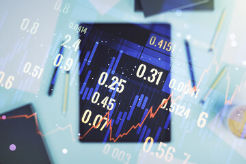 Poster - Abstract creative financial graph and modern digital tablet on desktop on background, top view, financial and trading concept. Multiexposure