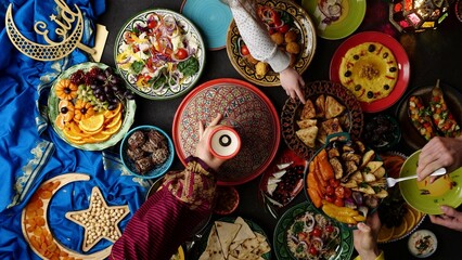 Eid holiday table. Ramadan family dinner. Breaking Fast, iftar. Arabic Middle Eastern traditional cuisine