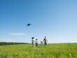 Family letting kite fly