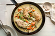 French chicken fricassee. saute chicken slow cooked in a creamy white sauce with mushroom and carrot