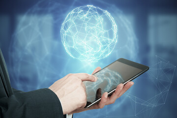 Poster - Close up of man hand pointing at mobile phone with glowing polygonal globe hud on blurry background. Futuristic technology wireframe mesh polygonal element. Social Network Graphic Concept.