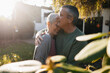 © Westend61 - Happy affectionate senior couple hugging in garden
