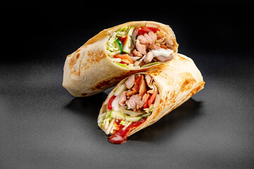 Sticker - Beef shawarma on a dark background. Shawarma with beef in pita bread