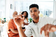 © Mikolette M/peopleimages.com - Time to think about success in more detail. POV shot of a young businessman holding a marker while giving a presentation in an office.