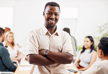 Poster - Success is guaranteed for those who work hard. Portrait of a young businessman standing in an office with his colleagues in the background.