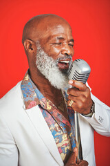 Poster - Im brining back the good music. Studio shot of a senior man wearing vintage clothes while singing into a microphone.
