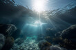 Underwater view of the ocean with sunlight shining through the water Generative AI