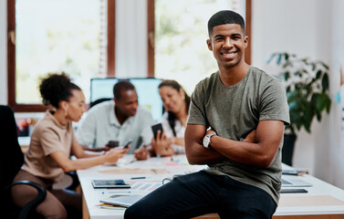 Sticker - Were about to change this industry for the better. Portrait of a confident young businessman with his team having a meeting in the background.