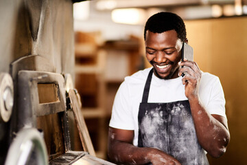 Poster - Ill make your lunchtime real special with a fresh delivery. a male baker using his cellphone while working.