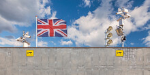 Conceptual Image Of An English Border Security Wall With United Kingdom Flag And Surveillance Camera's