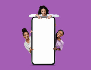 Poster - Great Offer. Three Happy Black Ladies Pointing At Big Blank Smartphone