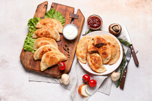 Composition With Tasty Meat Empanadas, Sauces, Vegetables And Spices On Light Background