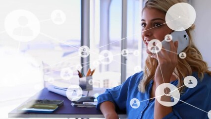 Poster - Animation of network of connections with icons over caucasian businesswoman talking on smartphone