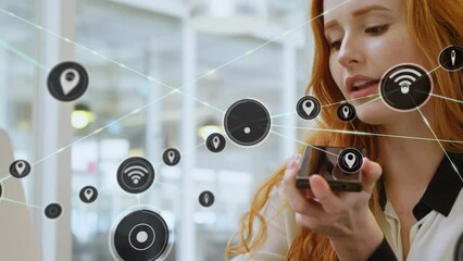 Poster - Animation of network of connections with icons over caucasian businesswoman talking on smartphone
