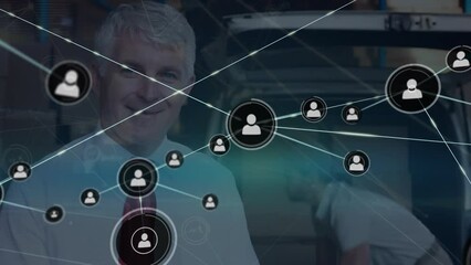 Poster - Animation of network of connections with icons over diverse business people working in warehouse