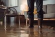 canvas print picture - Man mit Gummistiefel steht in einem überfluteten Haus - Generative AI