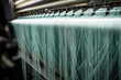 Close-up of fiberglass strands being woven together on a high-speed loom in a production facility, generative ai