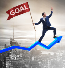 Wall Mural - Businessman achieving his business goals and targets