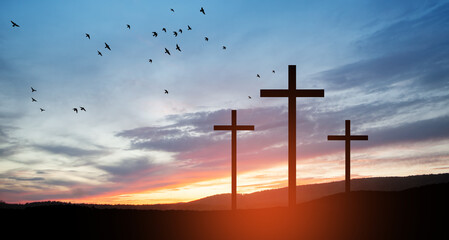 Wall Mural - Christian crosses on hill outdoors at sunrise. Resurrection of Jesus. Concept photo.